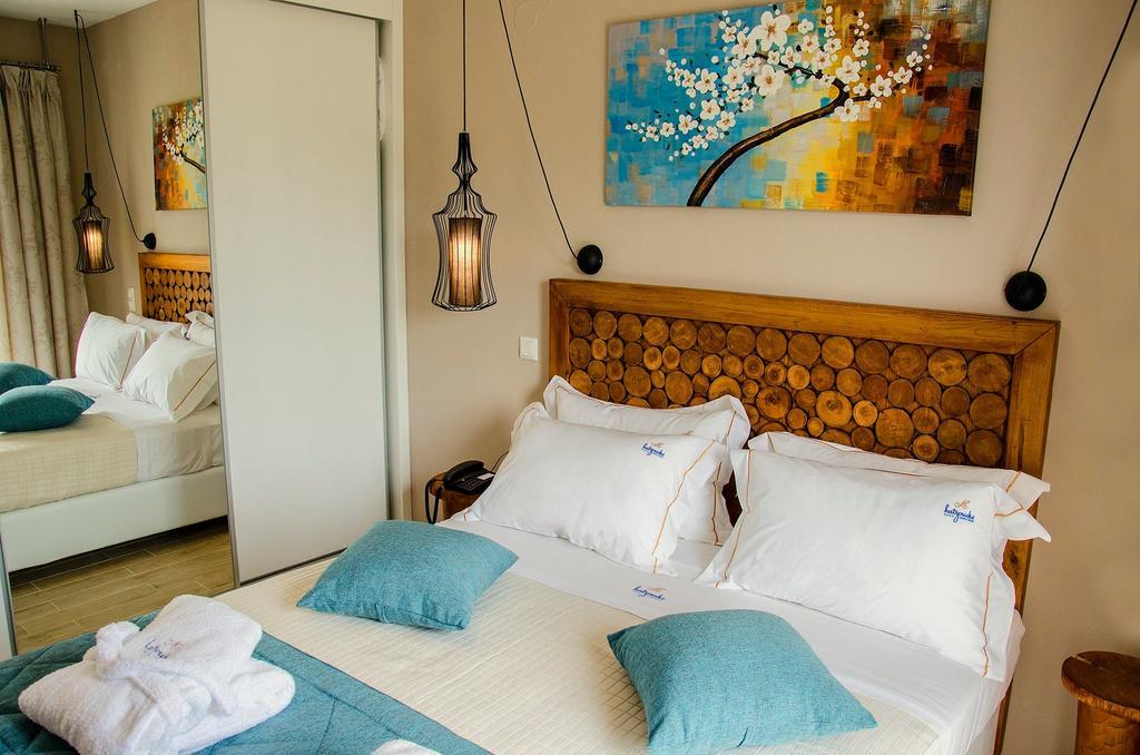 Hatzoudis Luxury Suites Chrysi Ammoudia Exterior photo